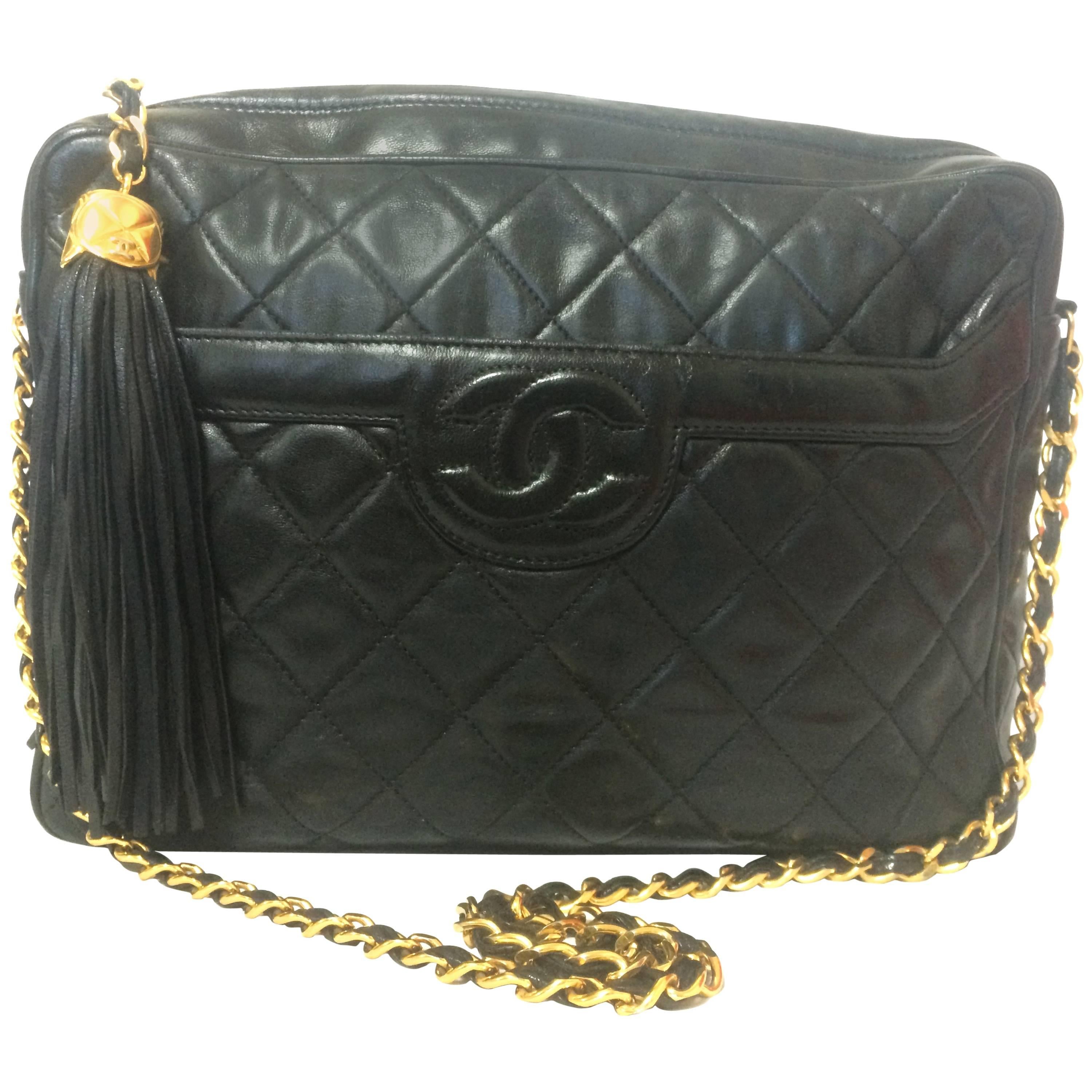Vintage Chanel black large camera bag style chain shoulder bag with a CC fringe