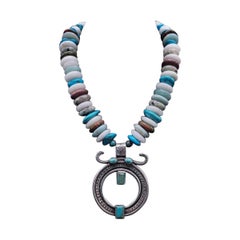 Used A.Jeschel Rich solid Zuni Sterling Silver pendant  with Turquoise necklace.