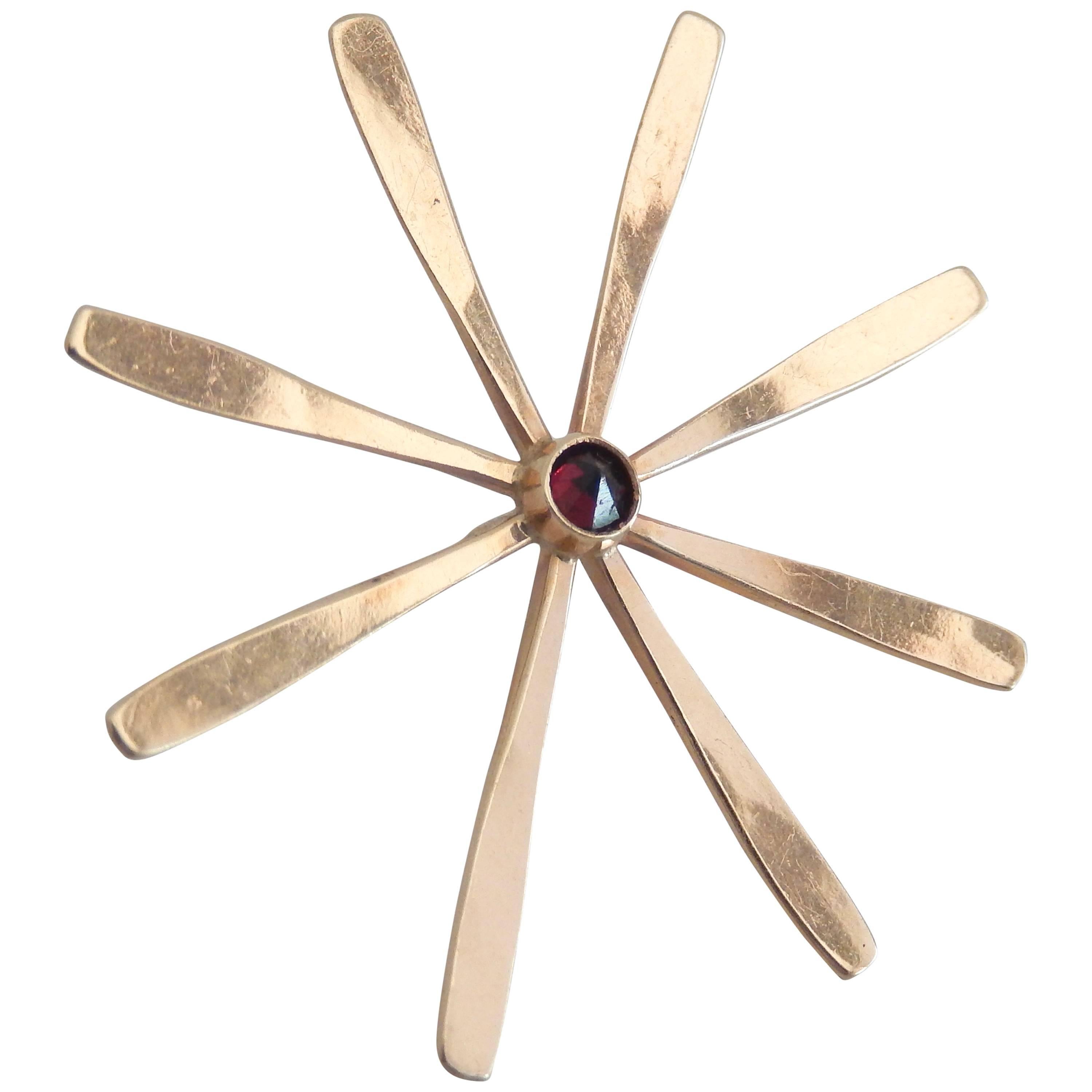 Ed Levin Mid-Century Gold and Garnet Starburst Pin For Sale