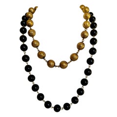 Vintage Chanel Black and Gold Sautoir Necklace 