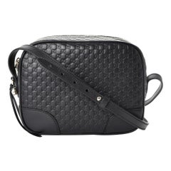 Gucci Microguccissima Mini Bree Messenger-Tasche aus Leder in Schwarz