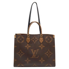 Louis Vuitton - Sac OnTheGo GM en toile géante à monogramme inversé