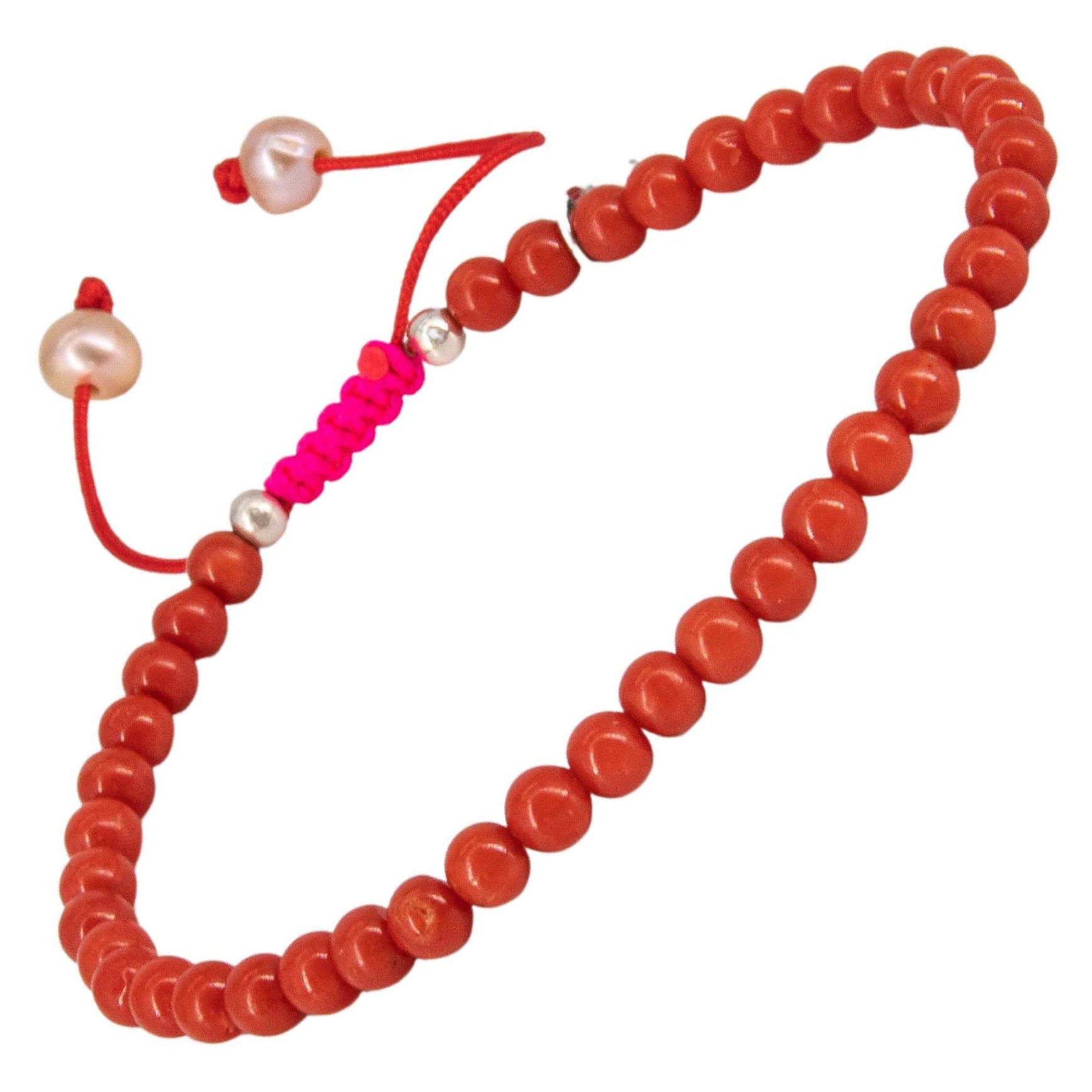 Red coral bracelet with neon pink drawstring closure and freshwater pearls For Sale
