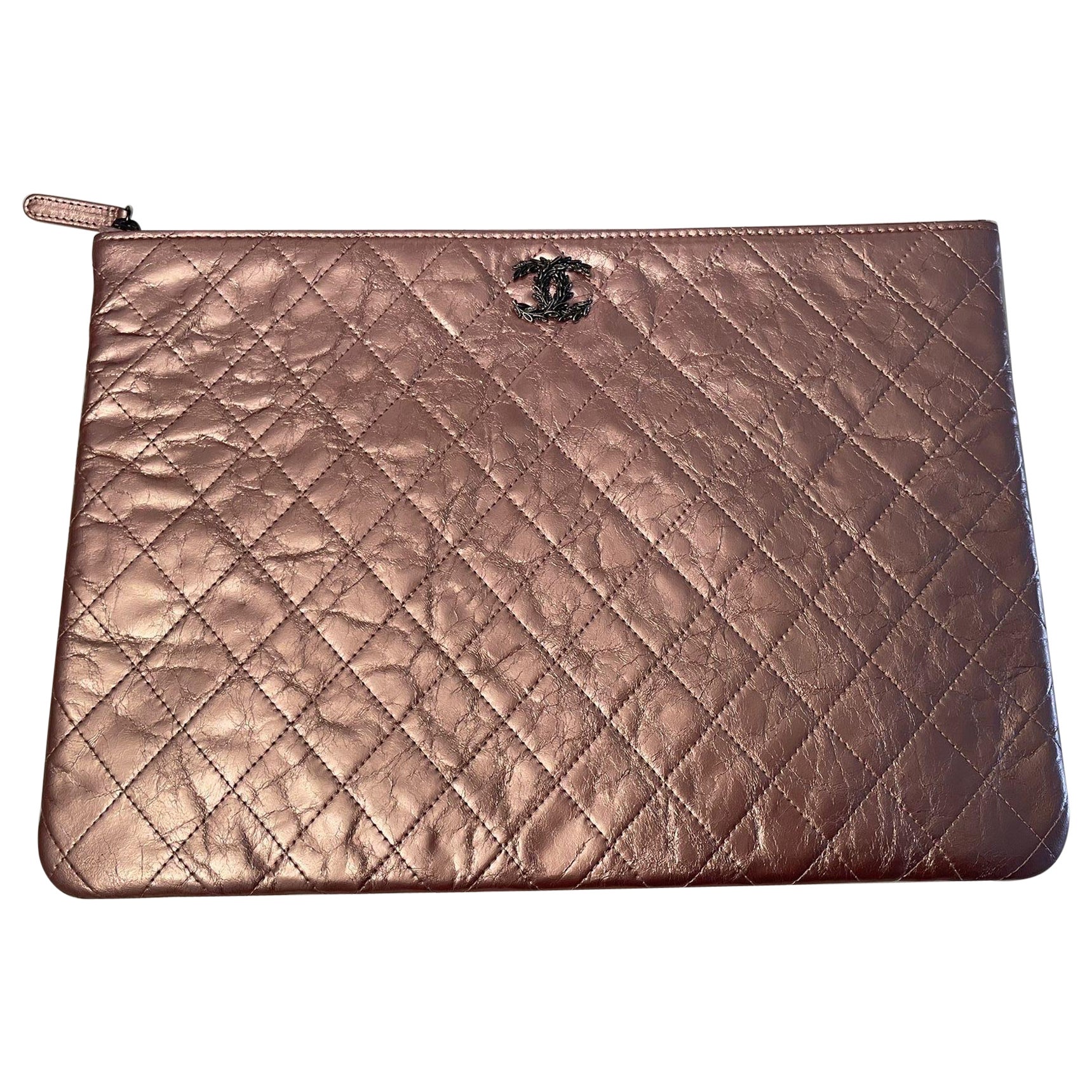 Chanel metallic pink clutch bag