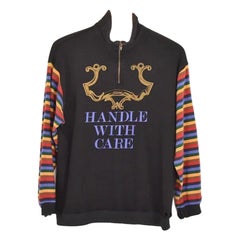 Retro 1990's Moschino 'Handle with Care' Quarter Zip Colourful sleeved Sweater