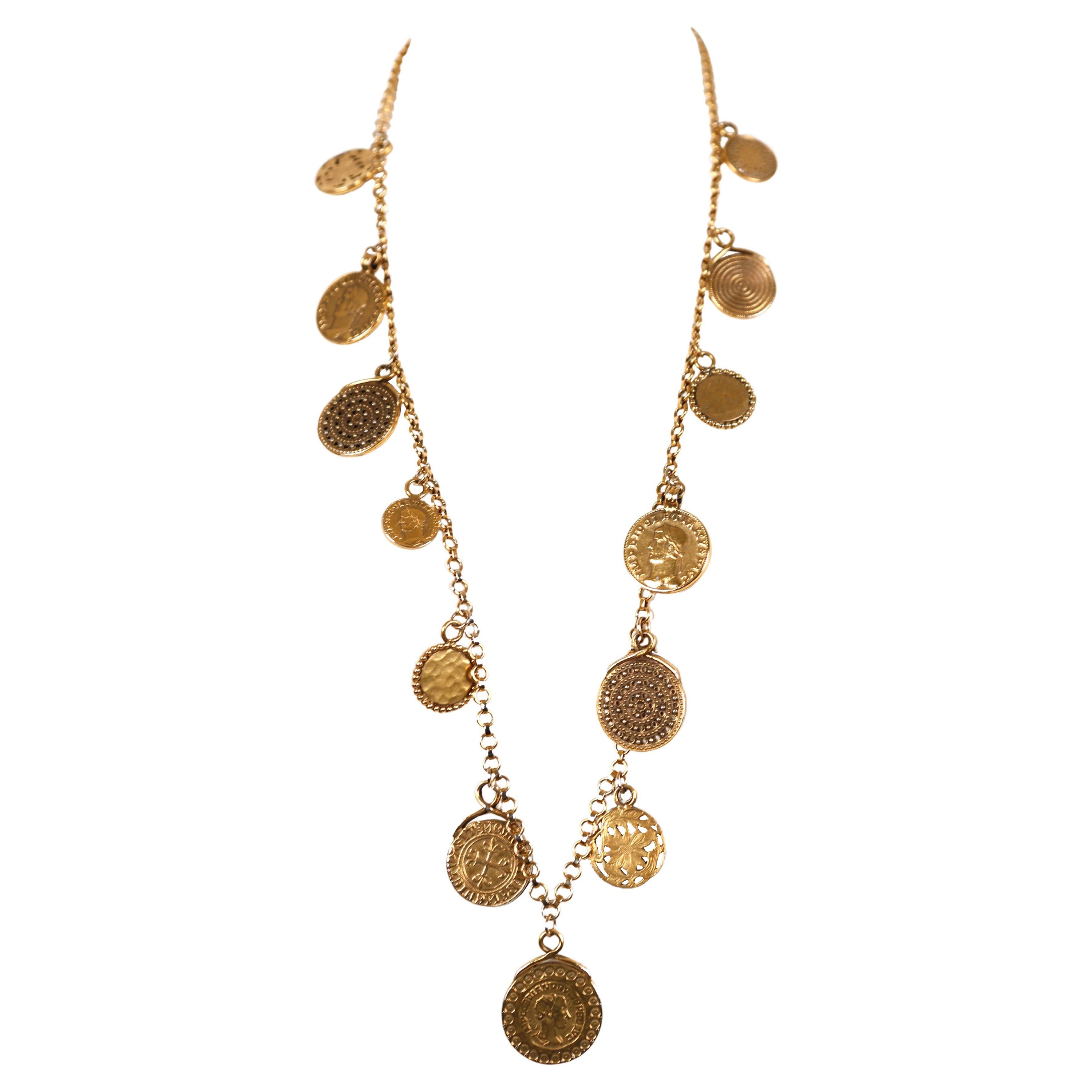 Very rare, Roman coin necklace in antique gold-tone, designed by Yves Saint Laurent dating to spring of 1977  Necklace is approximately 32