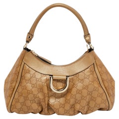 Gucci - Sac à bandoulière en cuir beige « Abbey D-Ring »