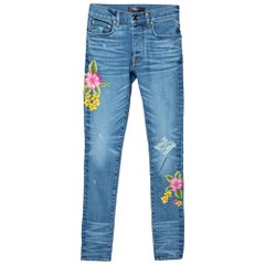 Amiri - Jean en jean délavé avec appliques florales et nœuds roses, taille XS