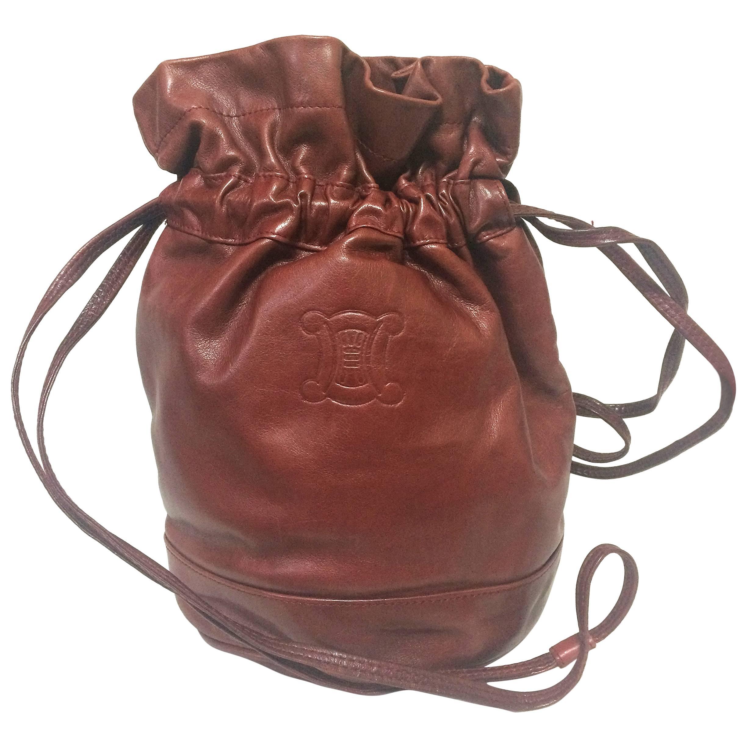 Vintage Celine wine brown nappa leather hobo bucket shoulder bag with blason For Sale