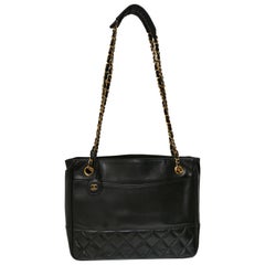 Vintage 1990s Chanel black leather gold hardware shoulder bag