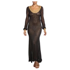 1970S Black & Gold Rayon Blend Knit Slinky Long Sleeved Dress