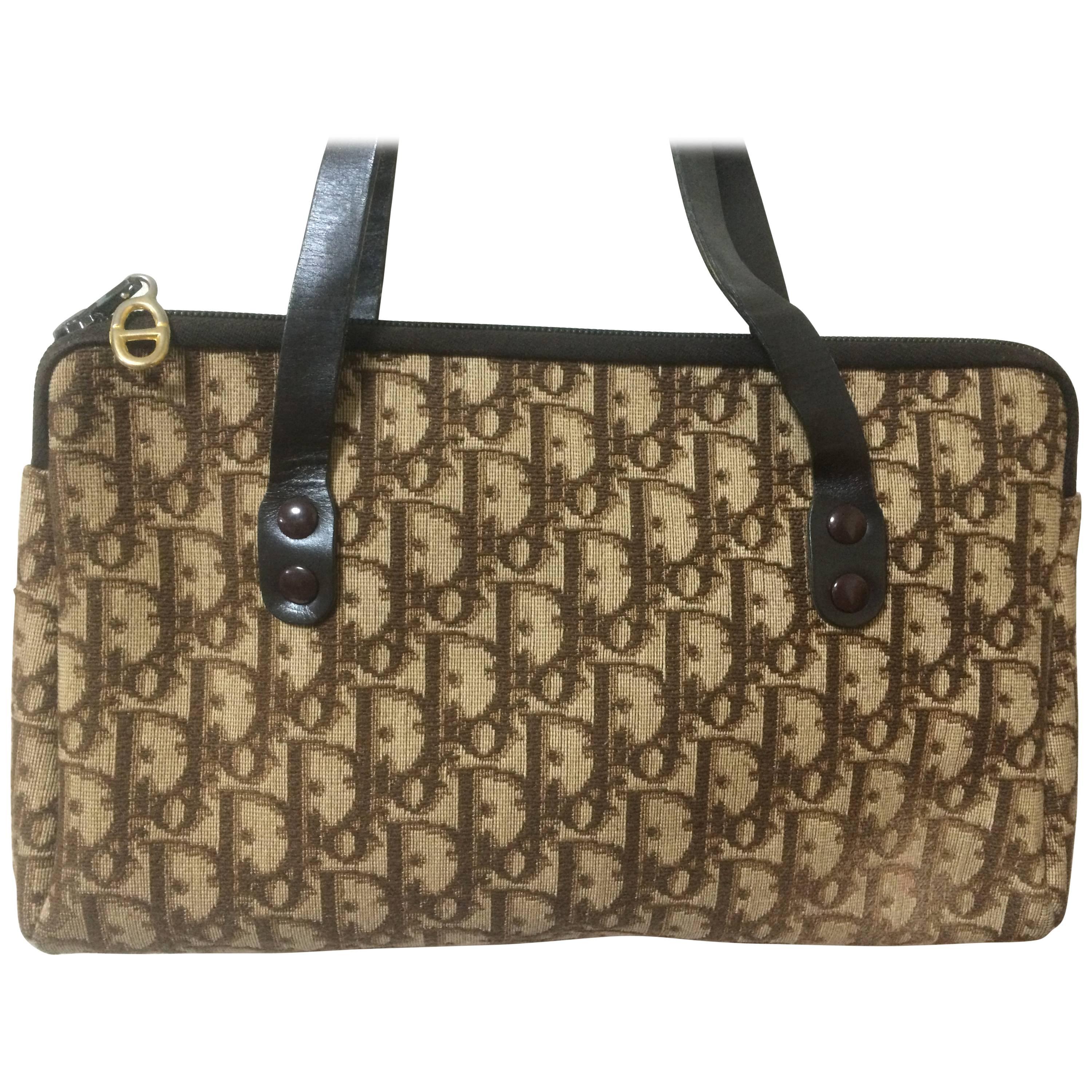 Vintage Christian Dior brown trotter jacquard mini handbag with leather handles.