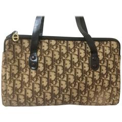 Vintage Christian Dior brown trotter jacquard mini handbag with leather handles.