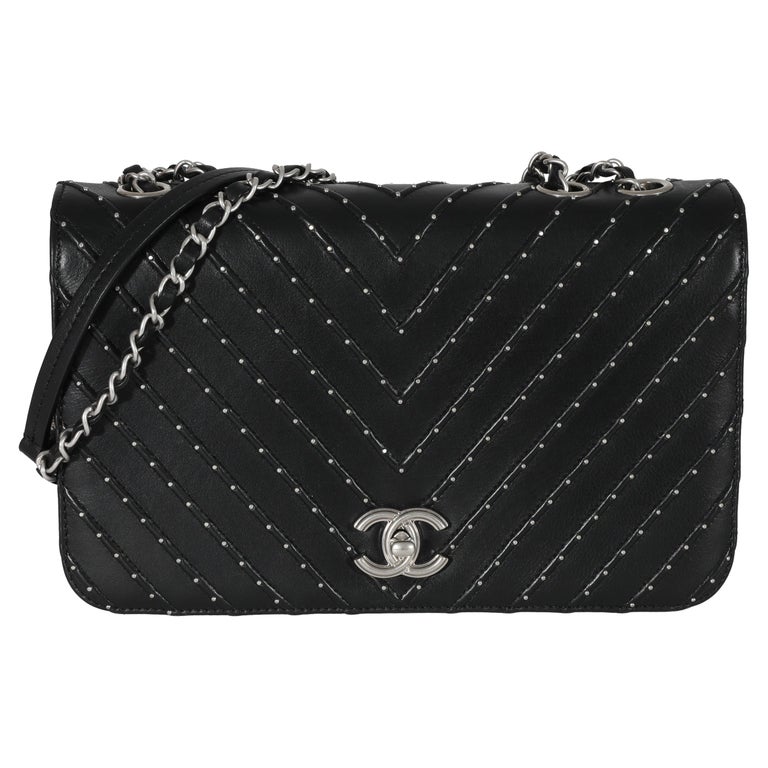 Chanel Studded Chevron Flap Bag of Black Calfskin with Silver Tone