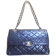 Vintage Chanel black 2.55 double flap shoulder bag. Paris limited edition.