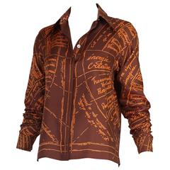 Retro Hermes "Naissance D'une Idee" Printed Brown and Orange Silk Blouse Top