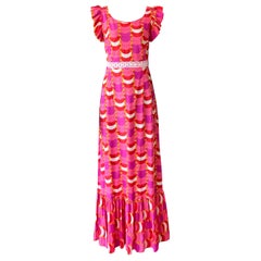 A spectacular vintage 1970’s patterned long evening dress with lace detail and f