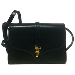 80’s Vintage Gucci black leather clutch shoulder bag with logo motif ...