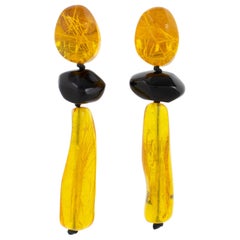 Retro Monies Dangle Clip Earrings Black and Amber Resin
