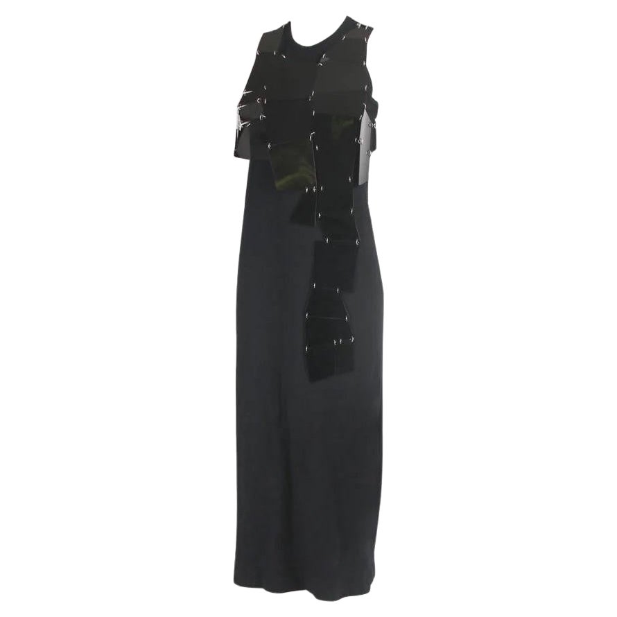 Comme Des Garcons Noir label sleeveless black dress with shiny frontal black abstract shapes linked with silvertone jump rings of varying lengths. Fabric tag is missing - fabric is stretchy and and feels like a wool blend. Size S. in excellent
