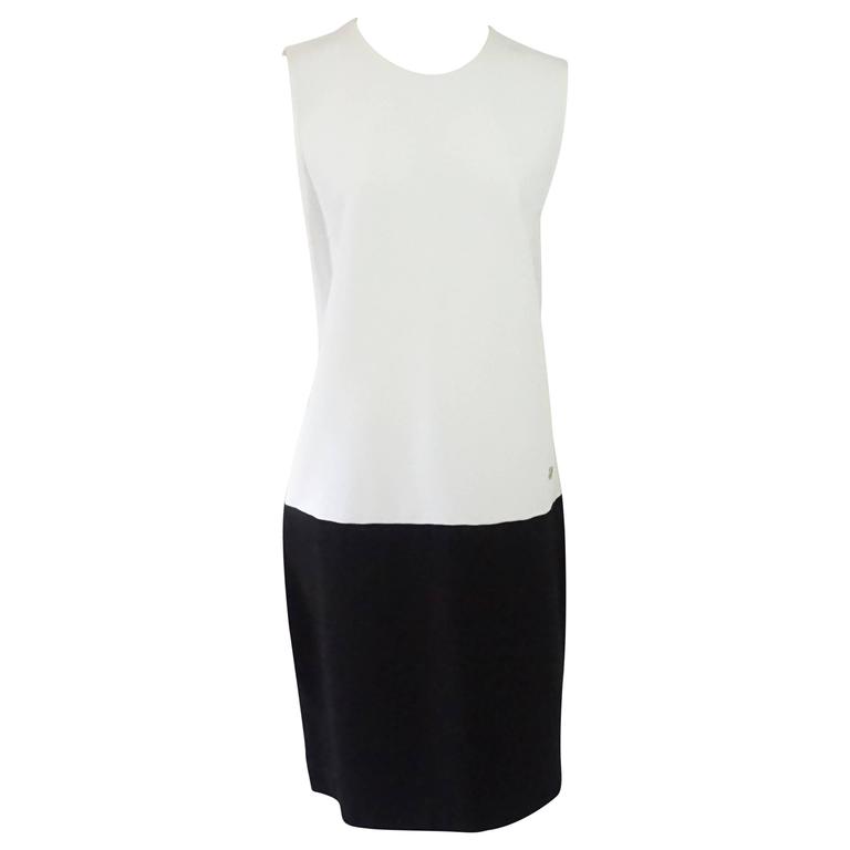 white sleeveless shift dress