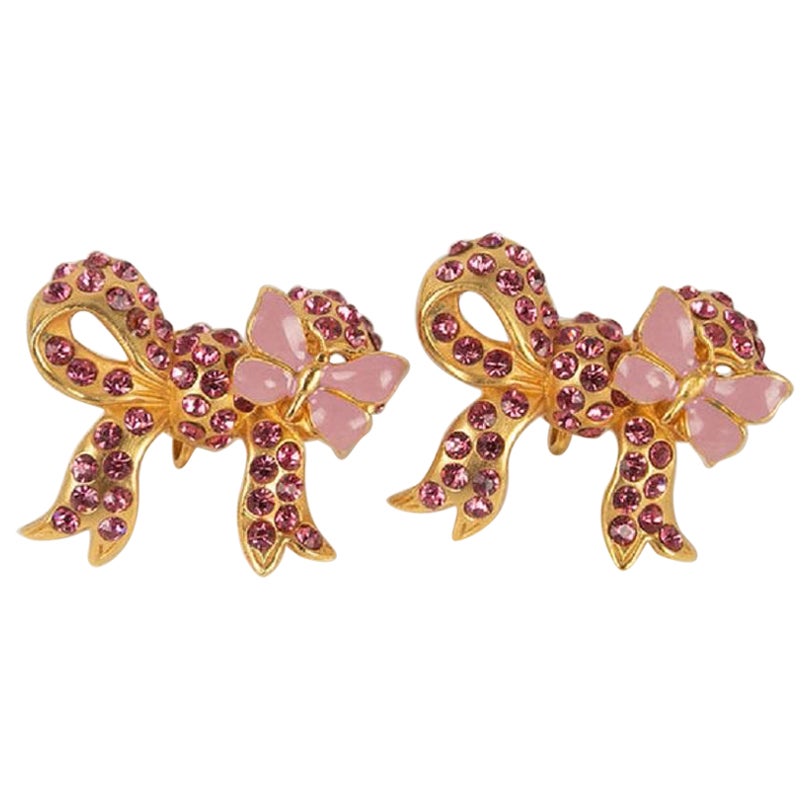 Nina Ricci Earrings Featuring a Golden Metal Bow Paved with Pink Rhinestones For Sale