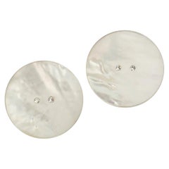 Nina Ricci Mother-of-Pearl Round Clip-on Earrings in Gilded Metal