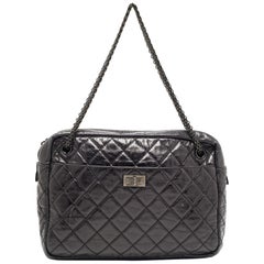 Chanel Borsa per fotocamera grande Reissue in pelle di vitello trapuntata nera