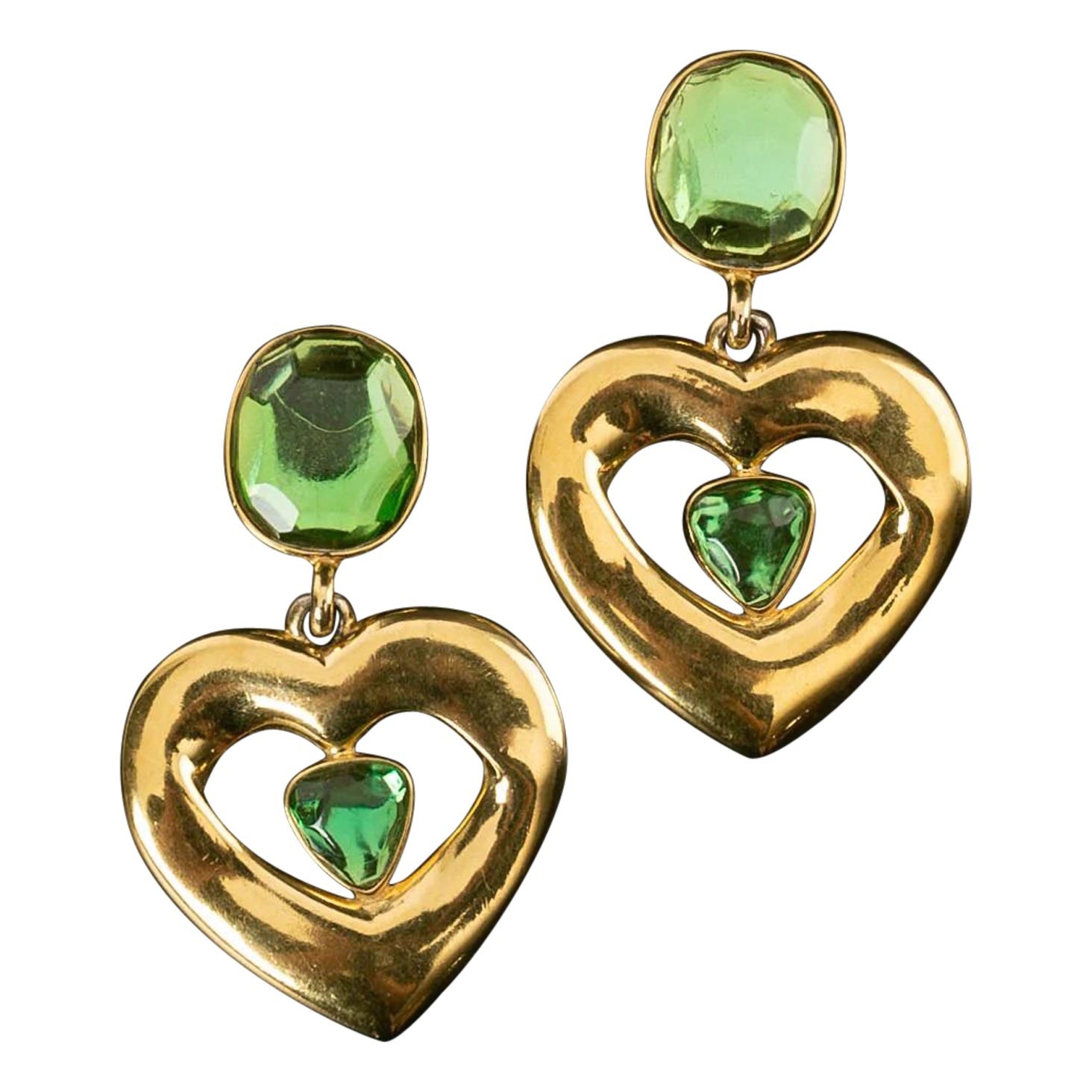 Yves Saint Laurent Clip-on Gilded Metal Earrings Holding a Heart Earrings For Sale