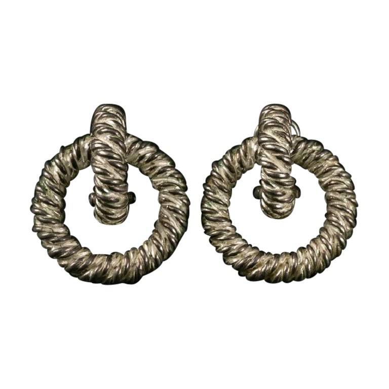 Hermès - Boucles d'oreilles à clip en métal argenté en vente