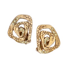 Christian Lacroix Gilted Metal Chiseled Clip-on Earrings with Golden Rhinestones
