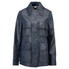 Stella McCartney Damenjacke aus marineblauem Vegan-Leder mit Laser-Schliff und Jakobsmuschelkragen