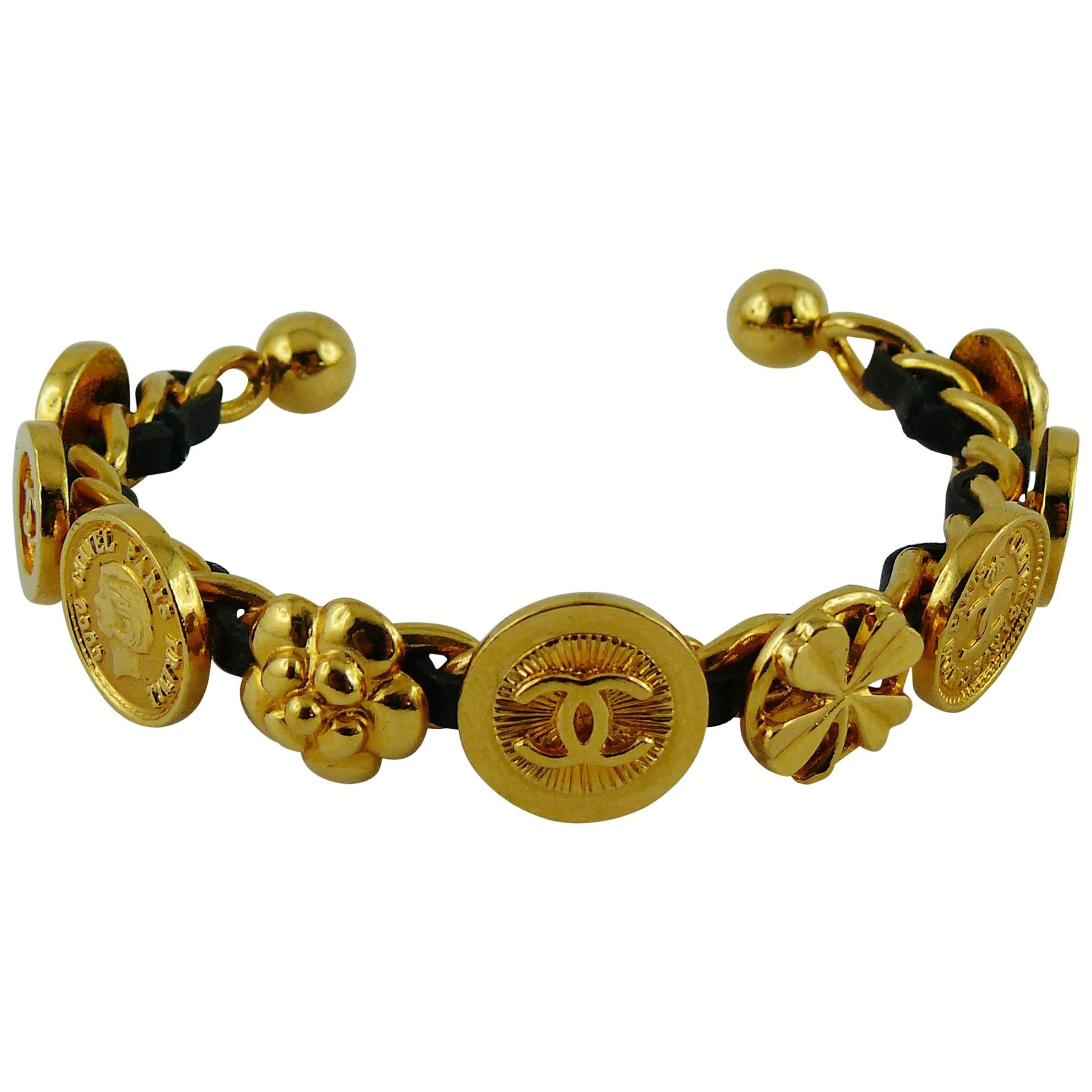 Chanel Vintage Interwoven Gold Toned Chain & Black Leather Coin Rigid Bracelet For Sale