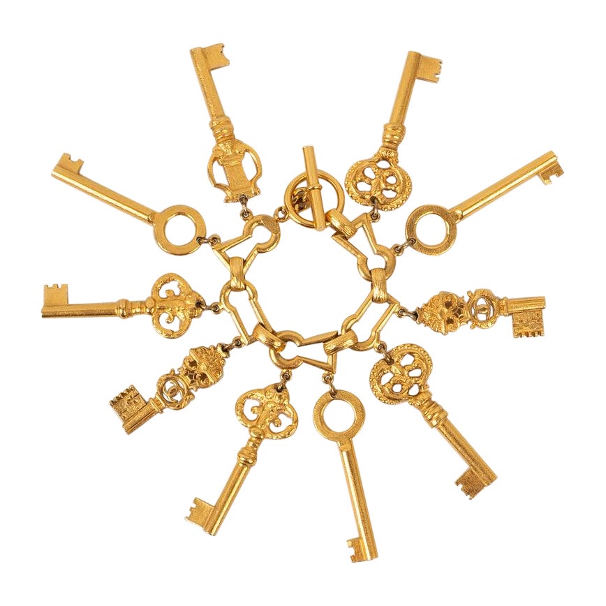 Iconic Chanel Gold-Plated Metal "Keys" Bracelet, 1993 For Sale