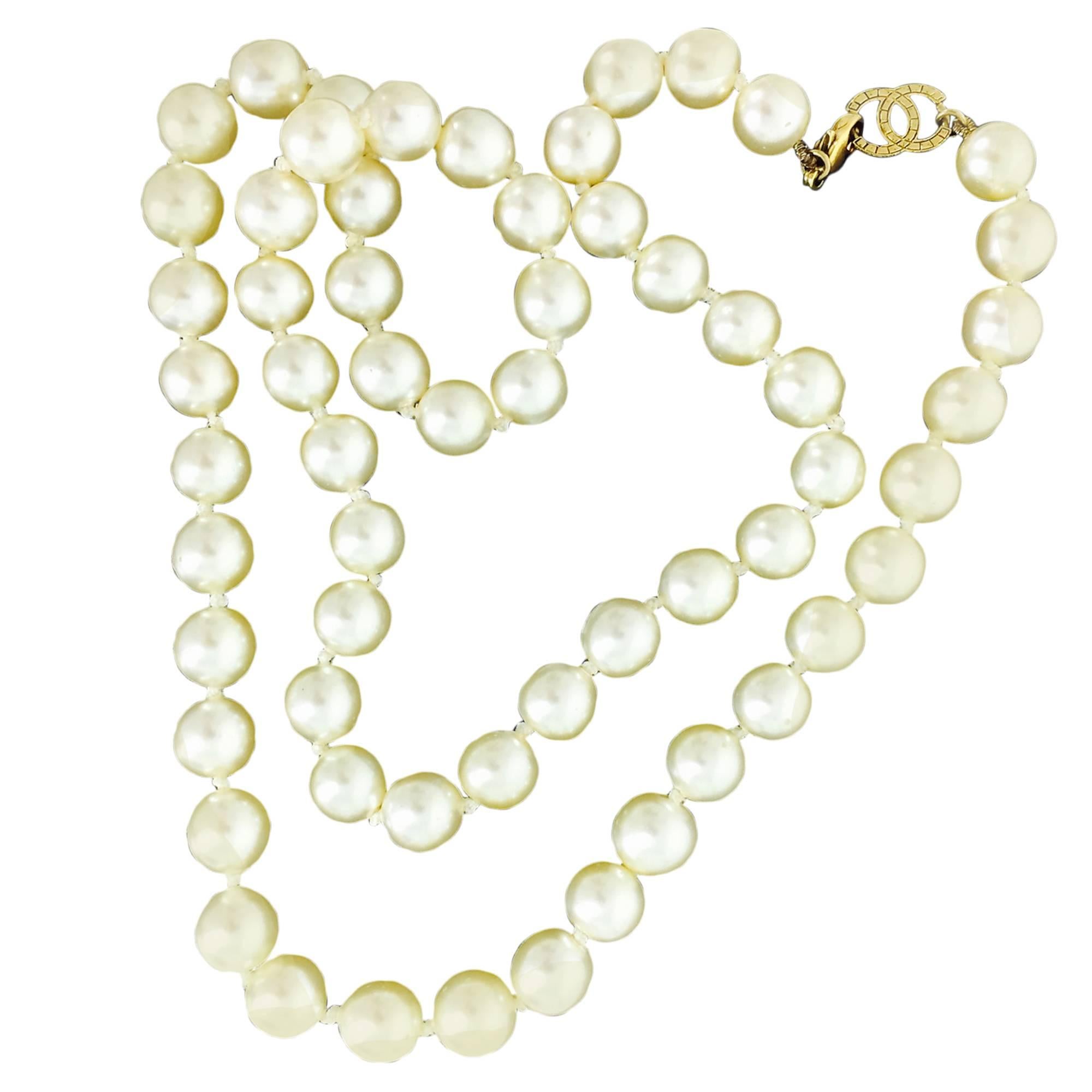 Chanel 2008 large and 16" long pearl necklace