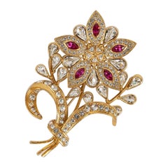 Retro Dior Gold Metal and Rhinestone Brooch Symbolizing a Flower