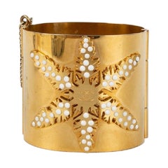 Chanel Cuff in Gilded Metal Featuring a Snowflake