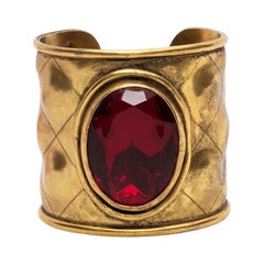 Chanel Gilded Metal Cuff Bracelet with Ruby Rhinestone
