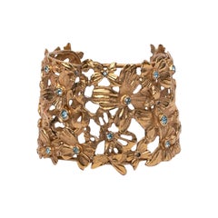 Yves Saint Laurent Golden Cuff Bracelet with Blue Rhinestones