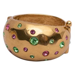 Yves Saint Laurent Goldenes Manschettenarmband mit Strasssteinen