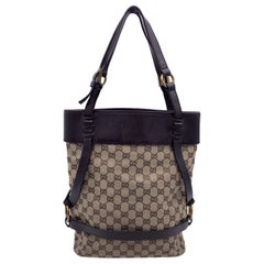 Bolso de hombro Tote de lona con monograma marrón de Gucci