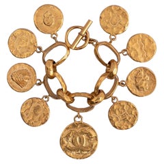Chanel Astrological Signs Charms Bracelet in Gilded Metal, 1994 Spring