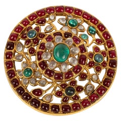 Chanel Brooch in Gilded Metal and Glass Paste