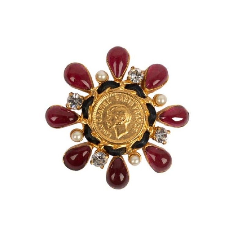 Chanel Brooch in Gold Metal, Black Leather, Rhinestones and Red Glass Paste For Sale