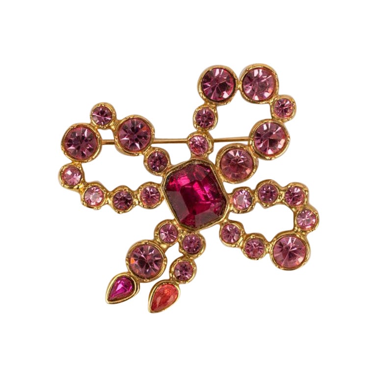Yves Saint Laurent Bow Brooch in Gold Plated Metal and Rhinestone For Sale