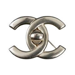 Chanel Turnlock Silver Plated Metal Brooch, 1996