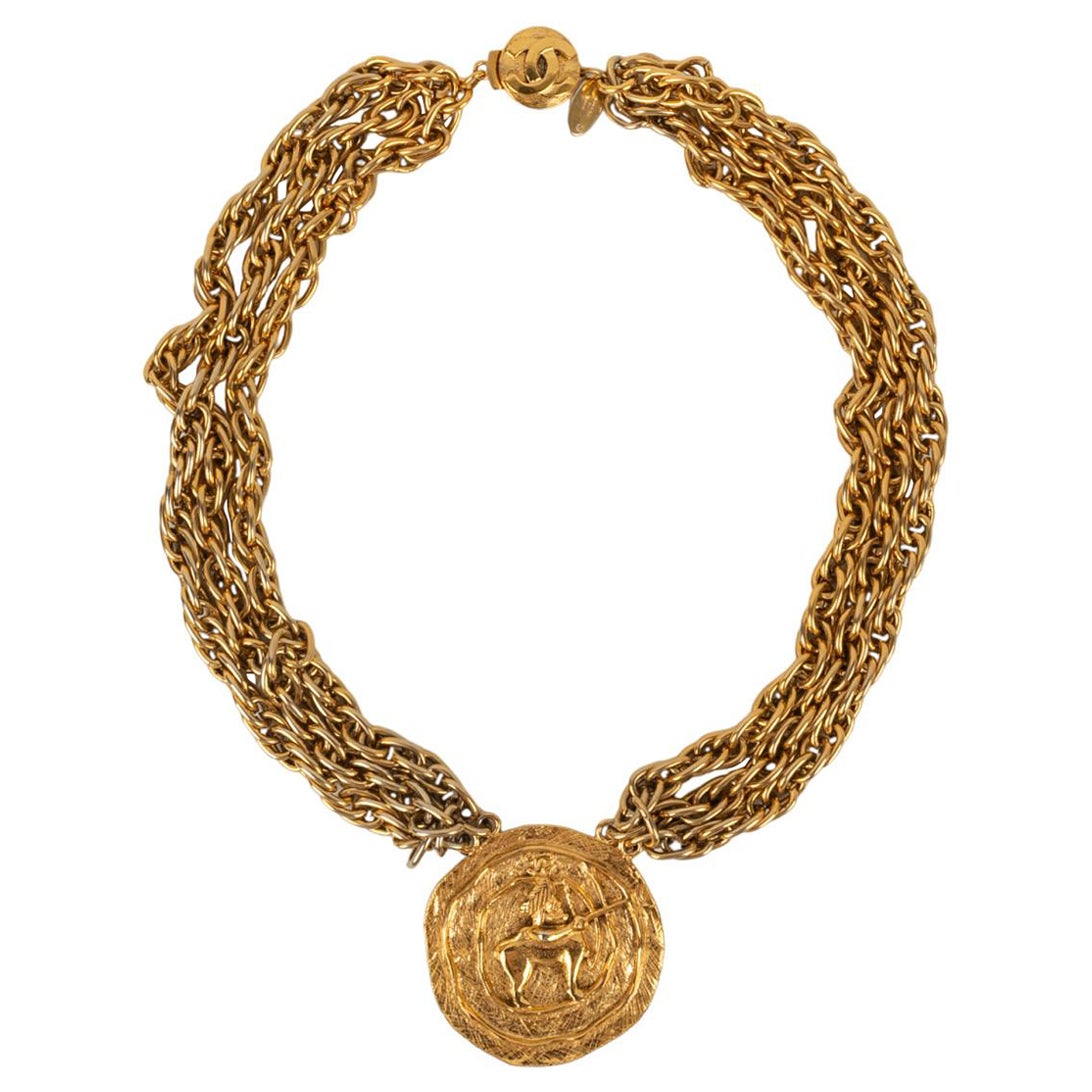 Chanel Multi Chain Necklace in Gold Metal and Engraved Medallion For Sale