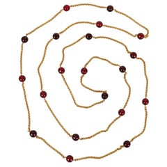 Chanel Necklace in Red Glass Beads and Gold Metal Chain