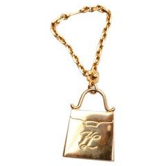 Karl Lagerfeld Keyring or Handbag Jewel in Gilded Metal