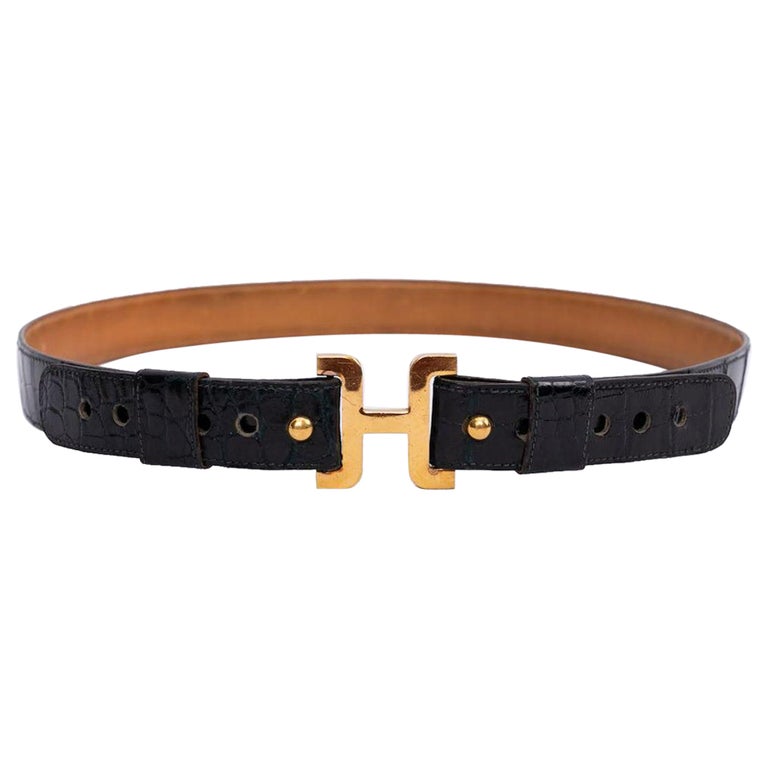 Cintura con fibbia H. Hermes in coccodrillo nero e metallo dorato in  vendita su 1stDibs | cintura hermes con scritta, cintura hermes piccola